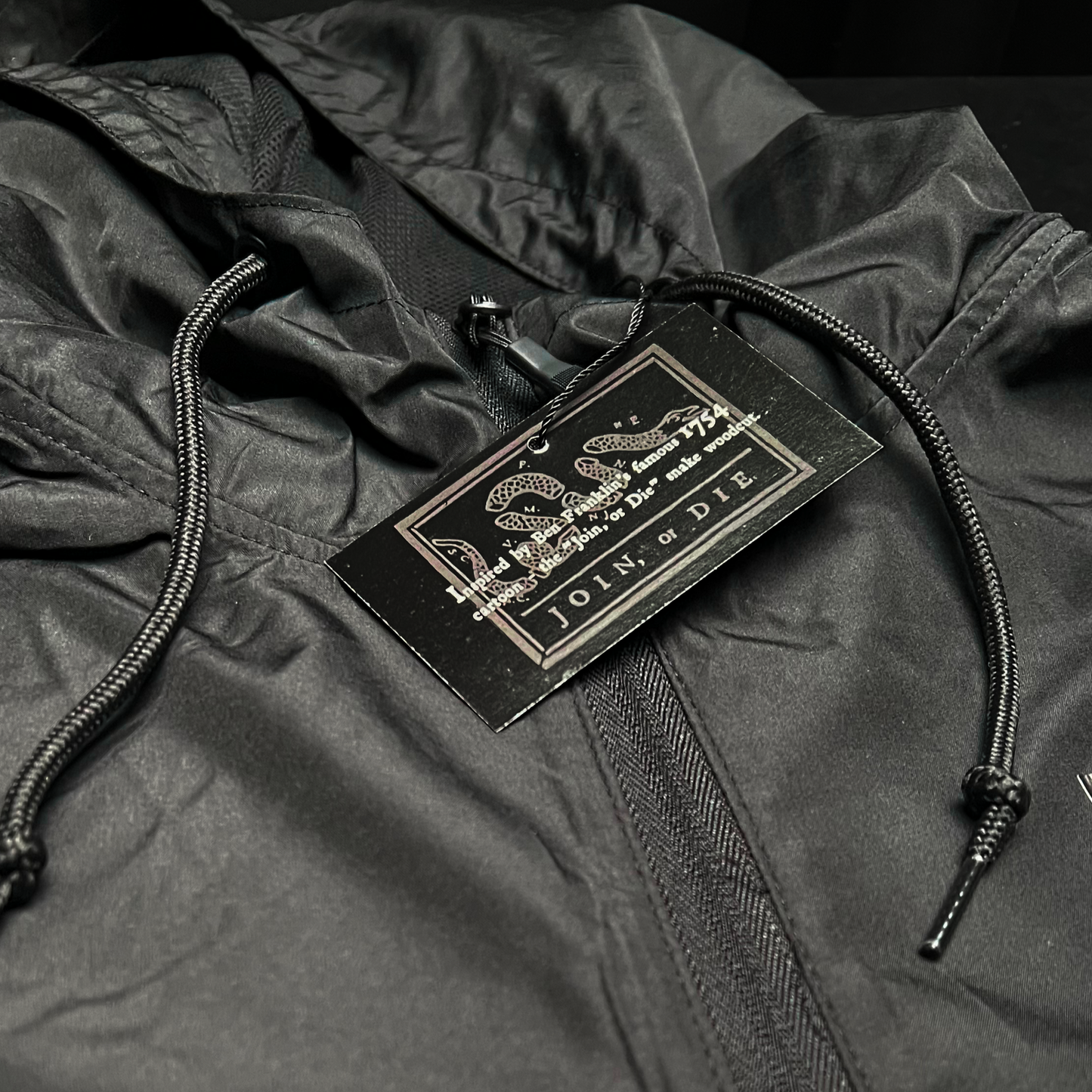 K,orD. PULLOVER HOODED WINDBREAKER